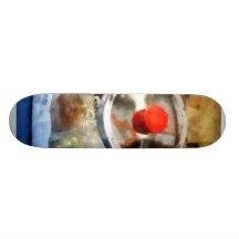 Två exponeringsglaskakaburkar skate board deck