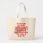 Underskatta aldrig driva av en kvinna tote bag