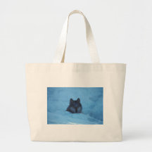 Varganseende i snö tote bags