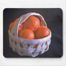 Vitbasket med orangar mus matta