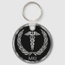 Sök efter mediciner nyckelringar Caduceus