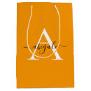 Sök efter svart orange presentpåsar För alla