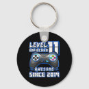 Sök efter videospel nyckelringar Komma