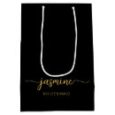 Sök efter svart och guld presentpåsar Skript