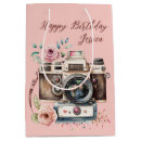 Sök efter fotografi presentpåsar För henne