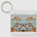 Sök efter delfin nyckelringar Vatten