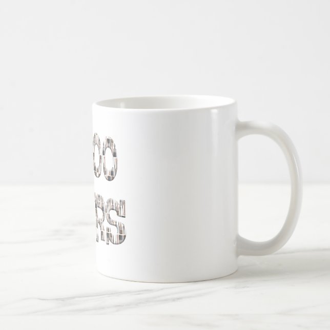 10000 hours with an overlay of paint brushes. kaffemugg (Höger)