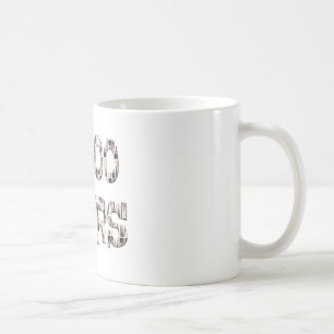 10000 timmar med en överlagring av penslar. kaffemugg