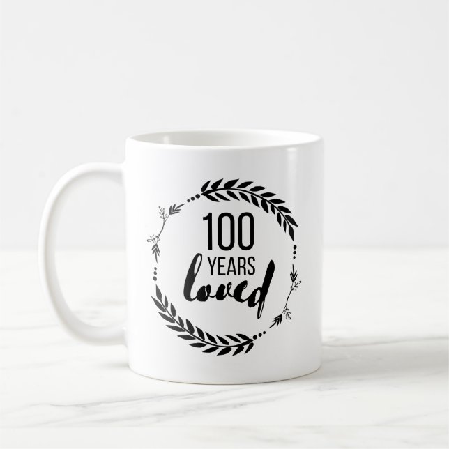100 år älskad sedan 1921, 100-årspresenter C Kaffemugg (Vänster)