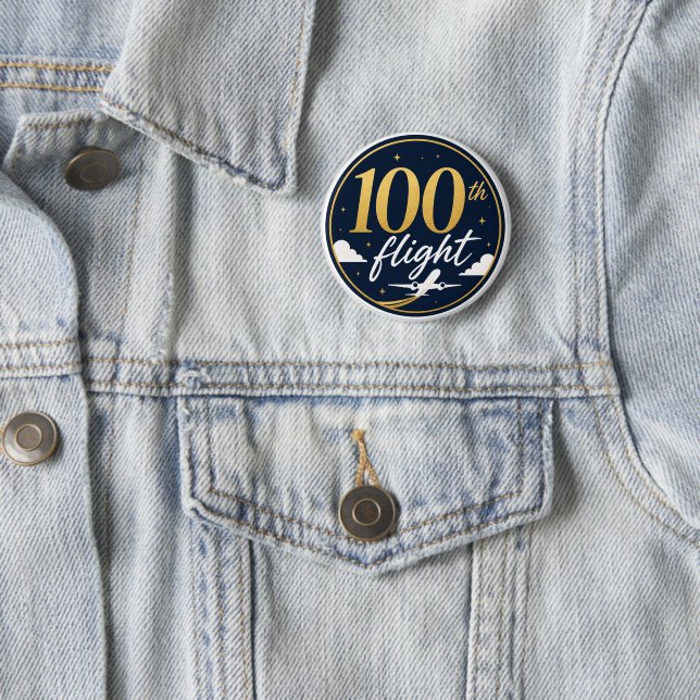 100:e flygning guld flygplan resminne knapp (In Situ)