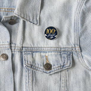 100:e flygning guld flygplan resminne knapp
