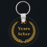10 års Sober Keychain för tillrättaläggsåterställn Nyckelring<br><div class="desc">Säkerheten kan vara svår,  men beroendeåterhämtningen är möjlig och måste firas! Att fira 10 år av nykterhet är en viktig milstolpe! Fira den här fantastisk-milstolpen och visa din älskade hur stolt du är.</div>