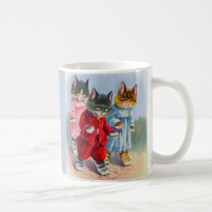 1930-talet klädda kattungar i regnet kaffemugg