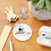 2025-gradens astronaut-nyckelkedja utanför världen