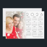 2026 Kalenderfamiljens fotoöverlägg i God jul Julkort<br><div class="desc">2026 Calendar Family Photo Overlay God jul. Tillgänglig digitalt och utskriven. Byt helt enkelt in fotot med exempelbilden och anpassa hälsning längs grund. Bilden ligger bakom en graderad tonopacitet lagrar så att texten kan visas överlagrad ovanpå den.</div>