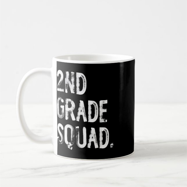 2:a klassens trupp tillbaka till skolan elev lärar kaffemugg (Vänster)