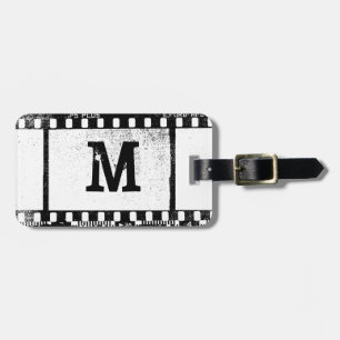 35mm filmar med monogramen bagagebricka