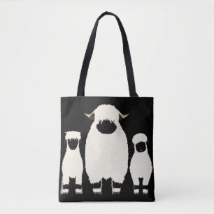 3 Valais Black Nose Sheep i rad Tygkasse