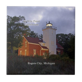 40 Mile Point Lighthouse vid skymning kakel