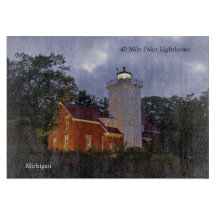 40 Mile Point Lighthouse vid skymning skärbräda