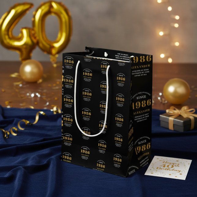 40th Birthday 1986 Black Gold Chic Elegant (Born 1986 birthday gift bag. Background out of focus.)