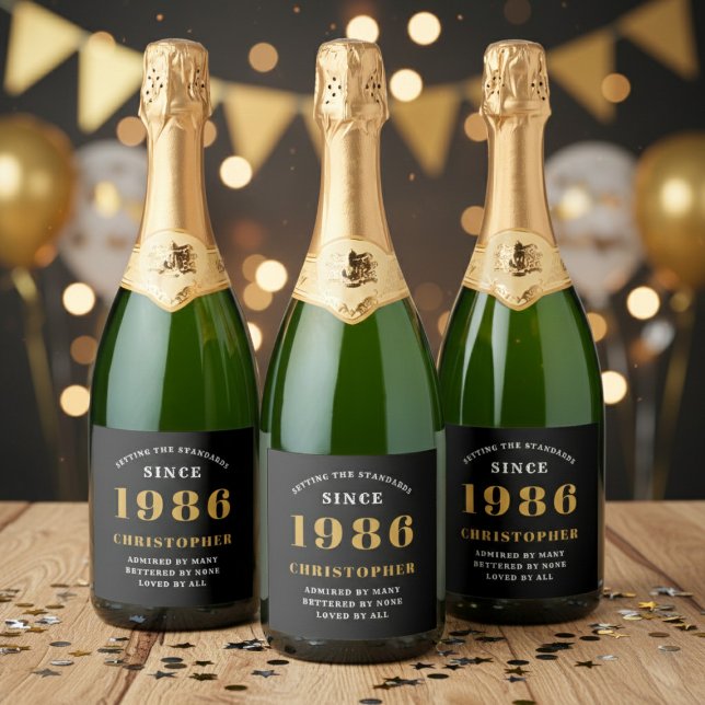 40th Birthday Born 1986 Add Name Black Gold (Born 1986 birthday sparkling wine bottle label. Background out of focus.)