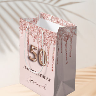 50-årsdagen rosa glitter droppar ro guld