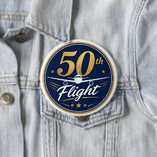 50:e flygning guld flygplan resminne knapp
