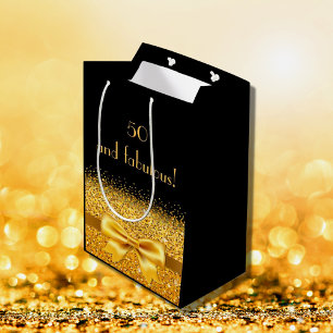 50 fantastiska svarta eleganter i guld