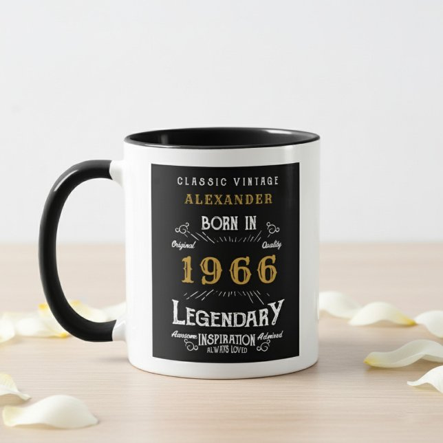 60-årsdag 1966 Legend Retro Svart Personlig Mugg (born 1966 birthday mug. Background is wood table, white wall and flower petals.)