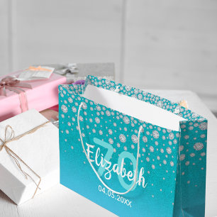 70-årsdiamanter glitter på tealblått grönt