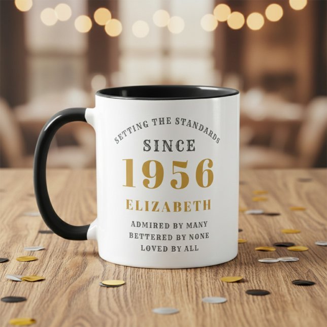 70th Birthday 1956 Add Name Elegant Mugg (Born 1956 birthday gift mug. Wood table, blurred background.)