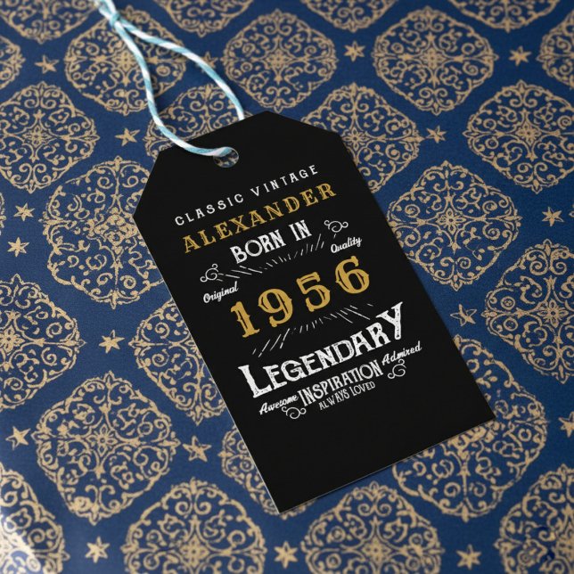 70th Birthday 1956 Add Name Legend Black Gold Presentetikett (Born 1956 gift tag on blue and gold wrapping paper.)