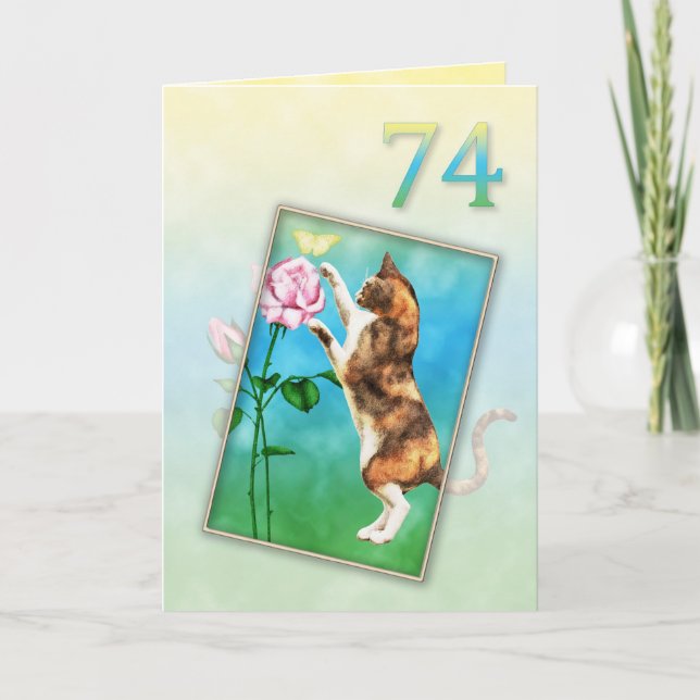 74:e födelsedagen med lekfull katt kort (Framsida)