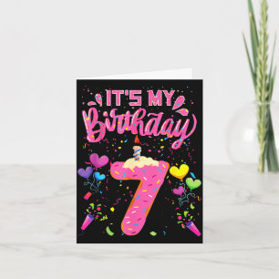 7-års födelsedagsmuffins glad 7 år gammal flicka b kort