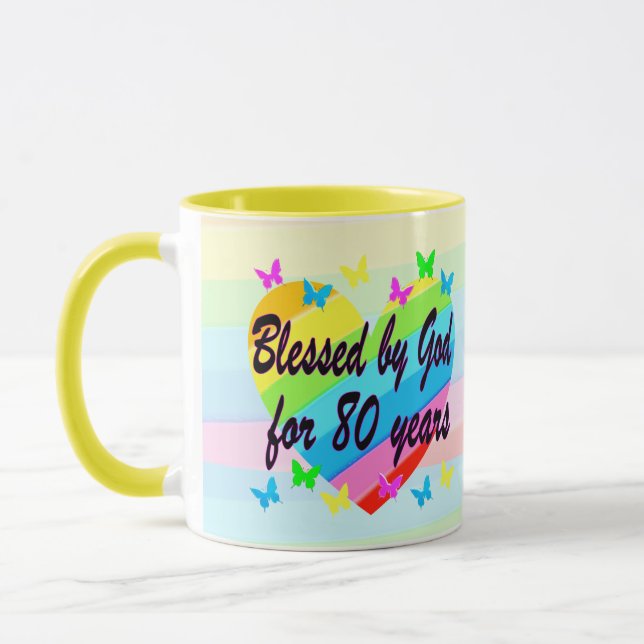 80:E BIRTIDAGENS BLÖSNINGAR OCH PRAYERS MUGG (Vänster)