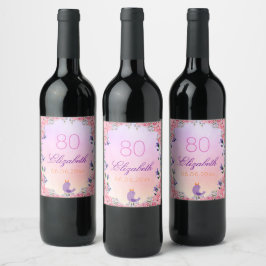 80:e födelsedagsfestens rosa violett blomma vinflaska etikett