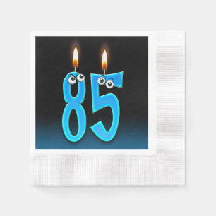 85-årsljus med ögonbollar pappersservett