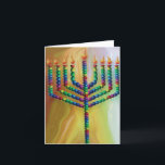 8 dagar Chanukah Helgkort<br><div class="desc">Ett vackert Chanukah-kort (Hanukkah) med matchande frimärke och kuvert. En skarp menorah med färgad med grönt,  blått,  gult och ljusa rosa mot en gyllene bakgrund.</div>