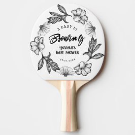 A baby brinner genom den gotiska blomman Babyskor Pingisracket