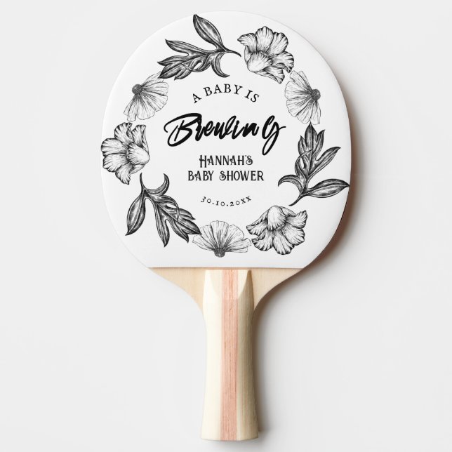 A baby brinner genom den gotiska blomman Babyskor Pingisracket (Framsidan)