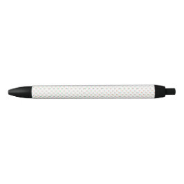 A ballpoint pen with a white, textured barrel 