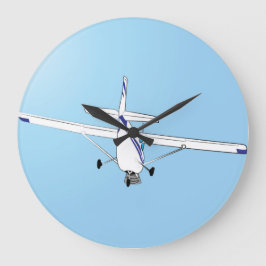 A Cessna under flygning Stor Klocka