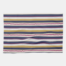 A decorative fabric features horizontal  kökshandduk