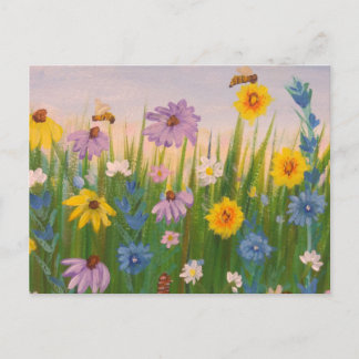 A fält fullt av blommor av vild vykort
