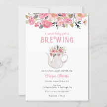 A Flicka håller på att blåsa tea Baby Shower