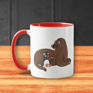 A friendly seal and a penguin cartoon mugg