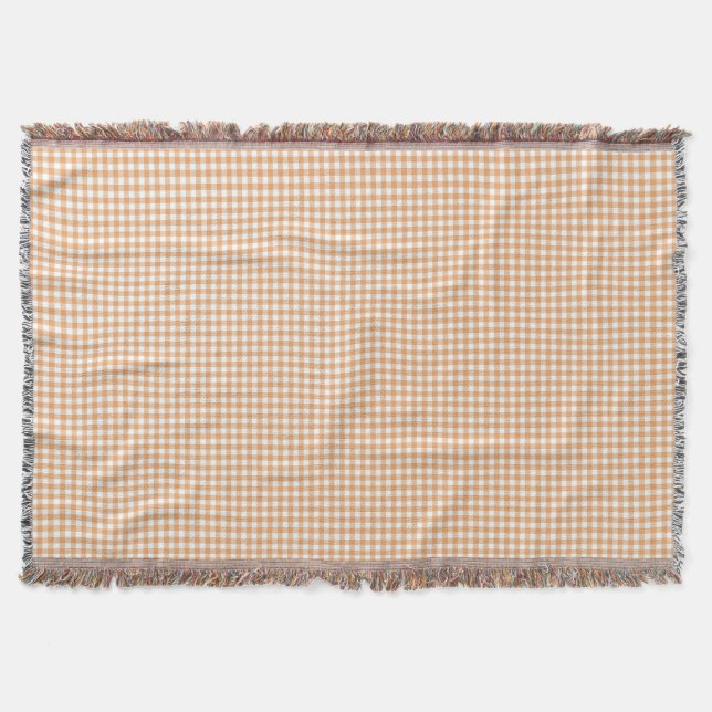 A gingham checkered blanket in shades of beige  filt (Framsidan)