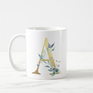 A, guld inledande med blå blommigt löv kaffemugg