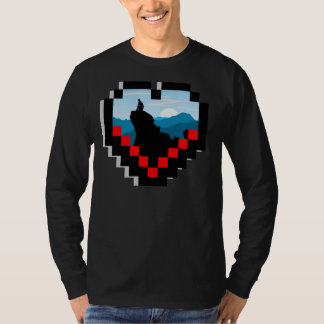 A lone figure sitting on a mountain peak at sunris t shirt